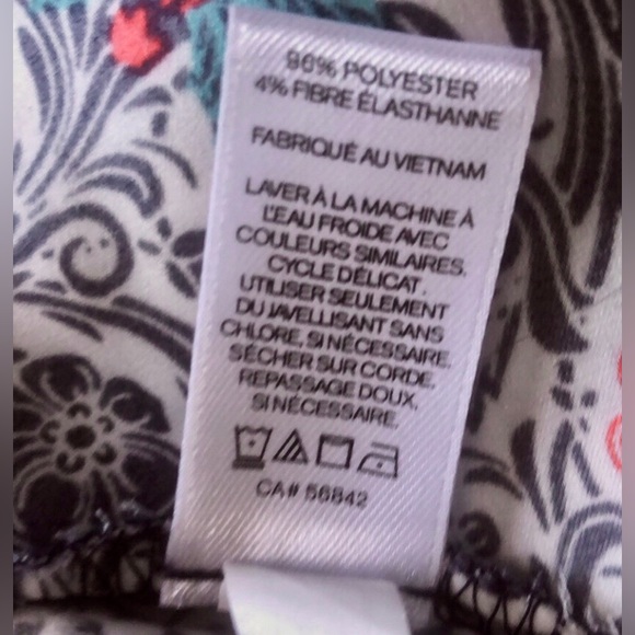 Express short sleeve colorful print top. Adj. front zipper excellent condition. - Picture 13 of 16